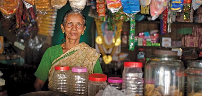Woman at market stall in India